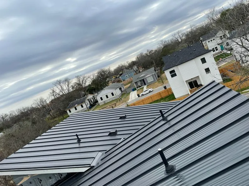 Standing seam metal roof panels with vents for Skylight Repair in East Grand Forks